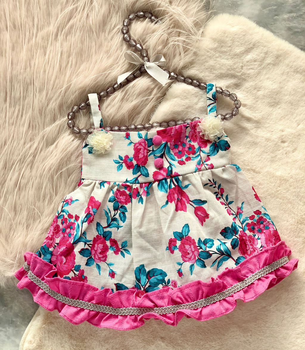 0703-Khaddar Pink Floral Patterns Sleeves less Frock
